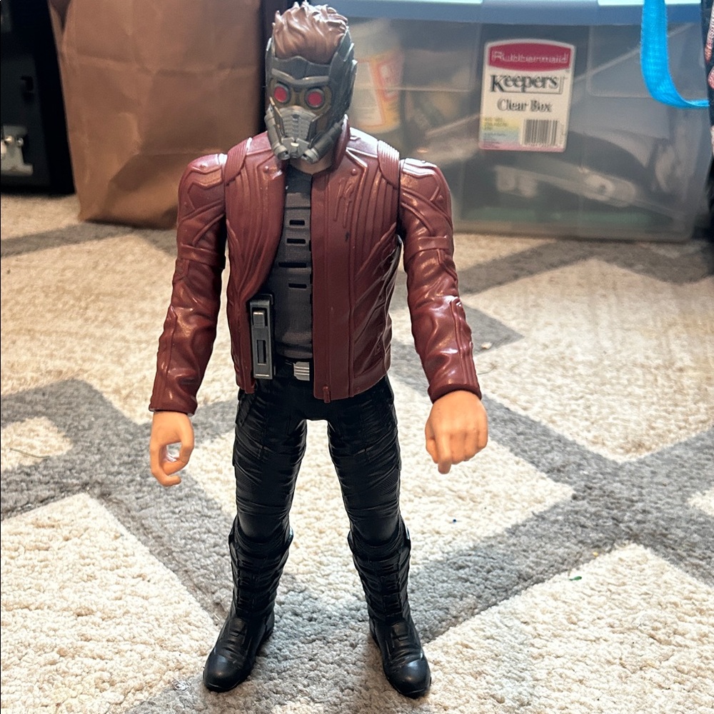 Action Figure with Red Jacket and Black Pants